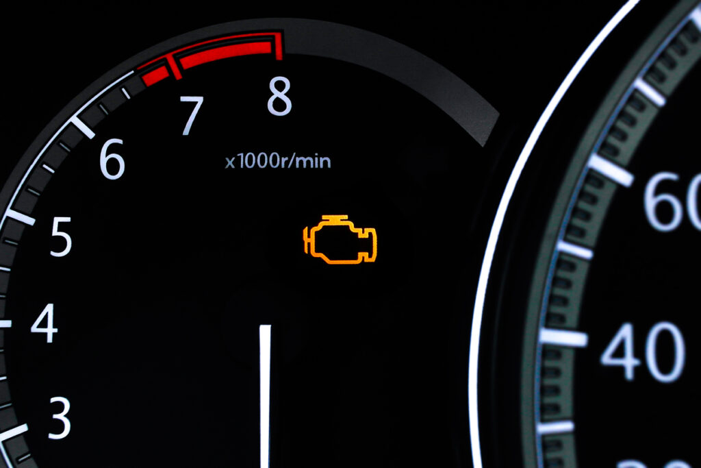 check engine light on car dashboard